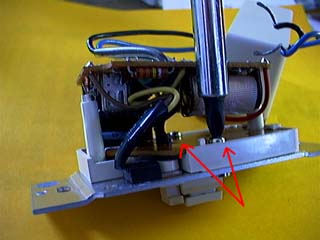 Location of two screws holding bottom P.C.B.