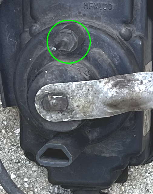 Closeup of upper travel limit stop pin on sensor