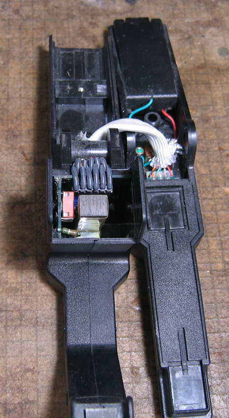visible (top) connector for inner PCB, with heat shrink-covered wires looped over